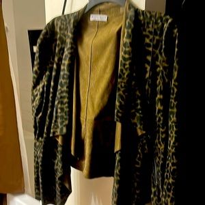 Olive and dark green animal print soft material jacket.